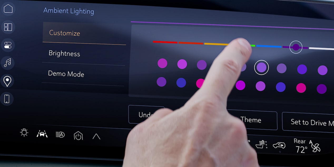 A Finger Pointing at the Infotainment Screen in a 2025 Buick Enclave