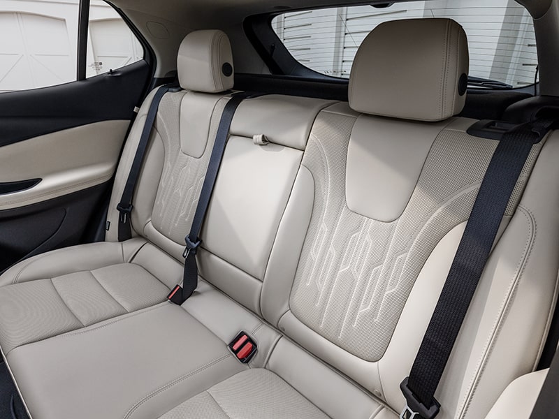View of 2025 Buick Encore GX Cream Colored Back Seat with Black Seatbelts