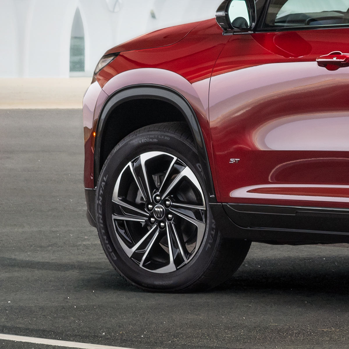 Close-up View of a Red Buick 2026 Enclave Front Tire