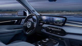 Three Quarters View of the Steering Wheel and Dashboard from the Front Passenger Seat of a 2026 Buick Enclave