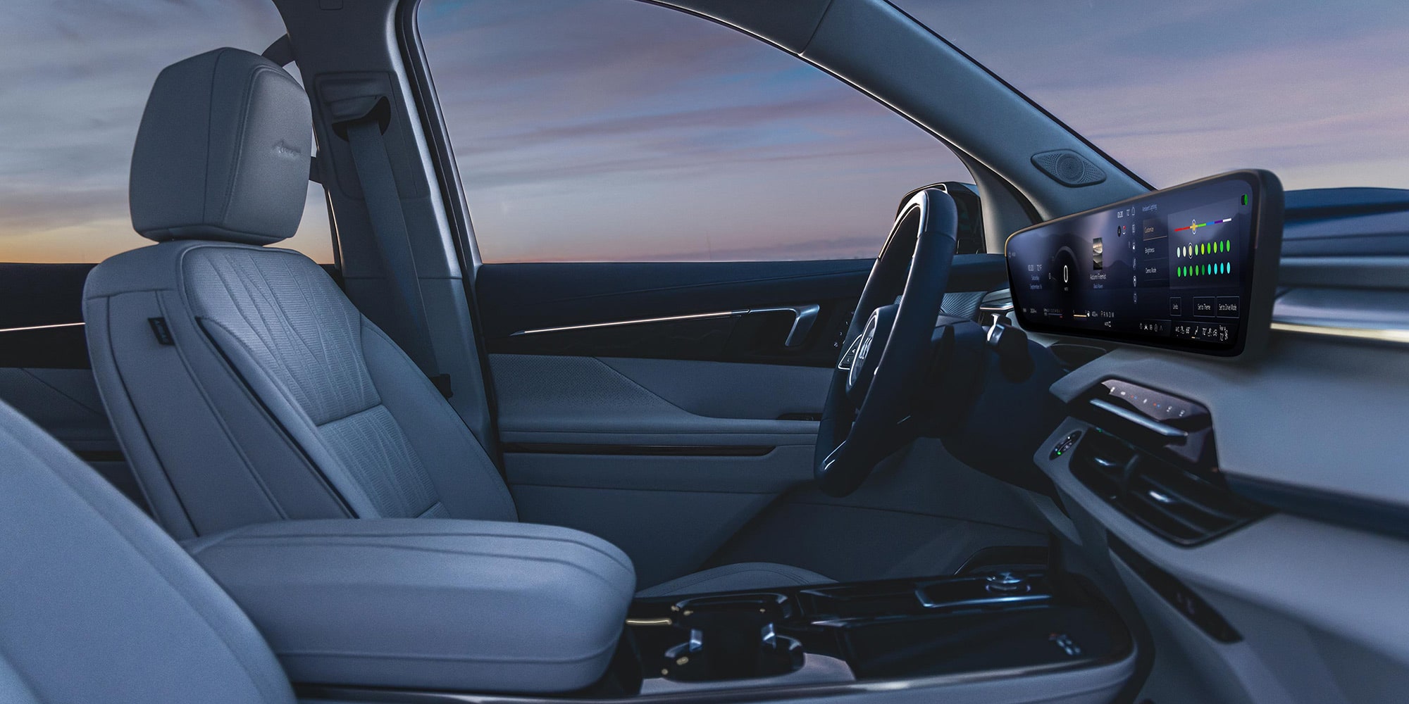Front Passenger View of a Steering Wheel and Display Dashboard Inside the 2026 Buick Enclave Mid-Size SUV