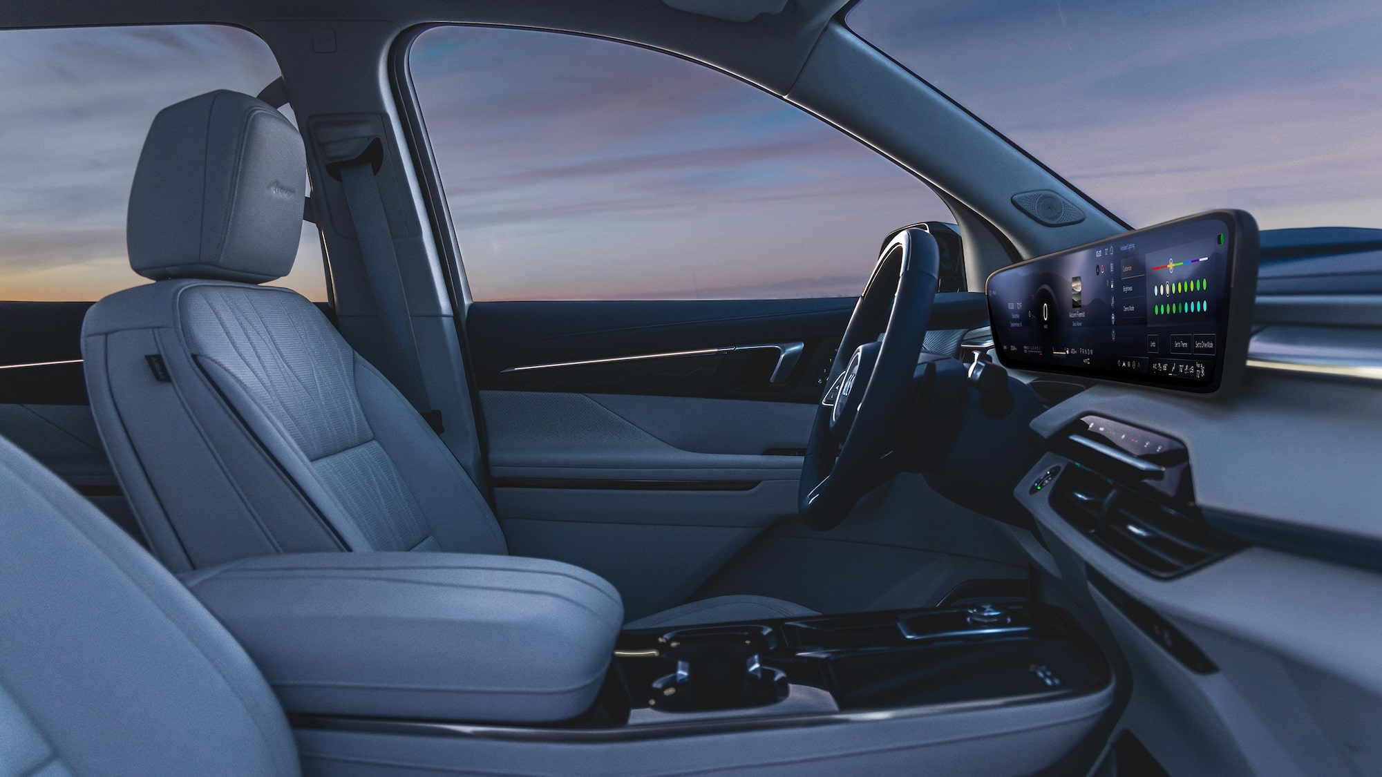 Front Passenger View of a Steering Wheel and Display Dashboard Inside the 2026 Buick Enclave Mid-Size SUV