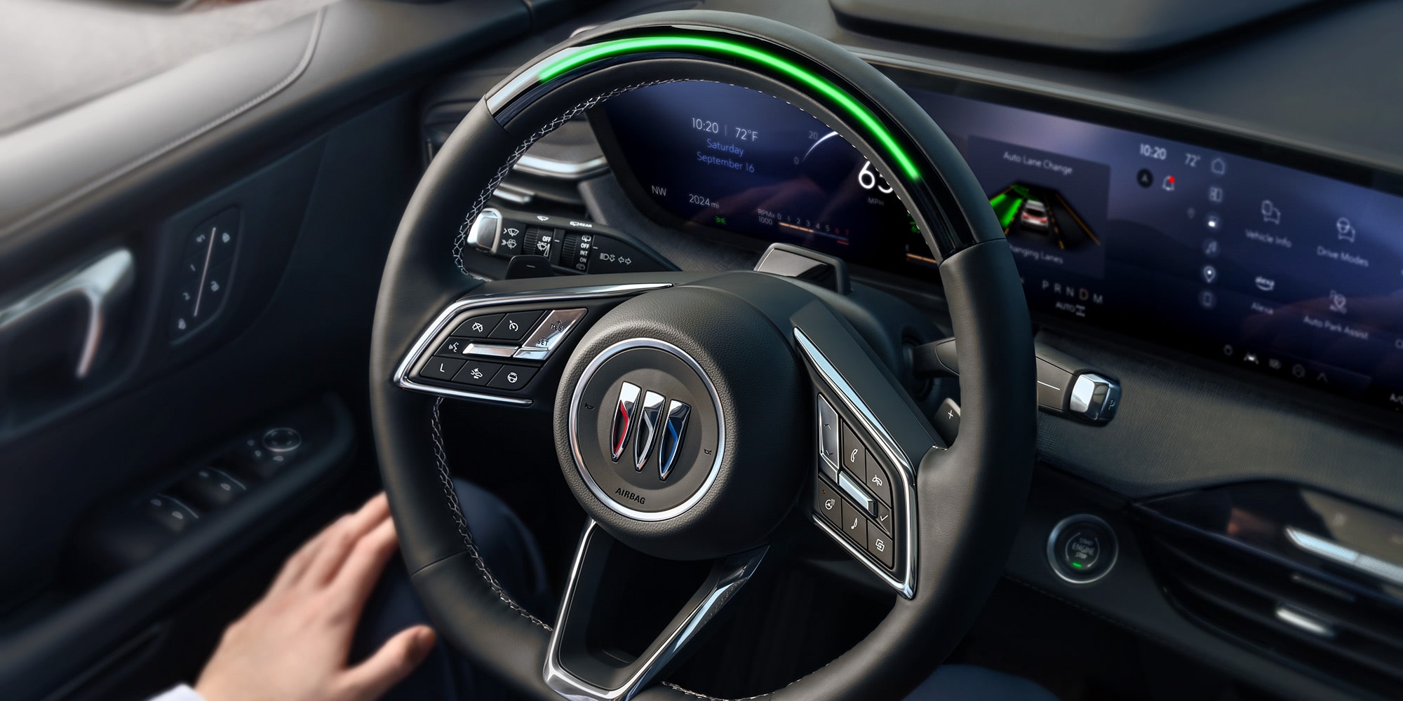 Driver’s Seat View of the Steering Wheel and Frontal Space of a 2026 Buick Enclave Interior