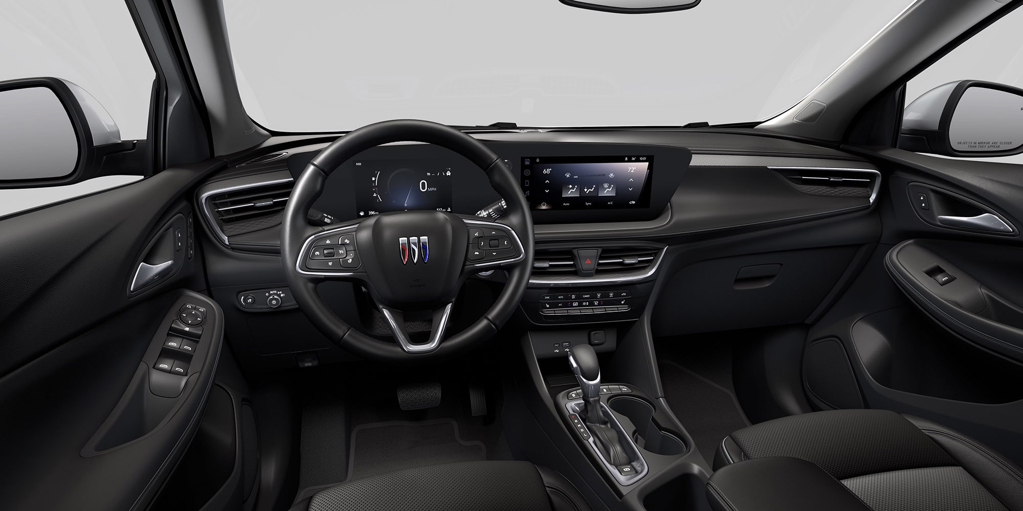 View of the 2026 Buick Encore GX Avenir Luxury SUV Dark Interior Dashboard, Steering Wheel, and Infotainment Screen