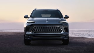 Front View of the 2026 Buick Encore GX Small SUV Parked on the Beach at Sunset