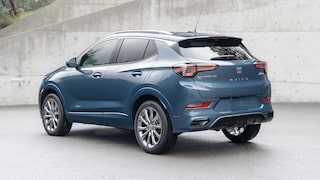 Rear Three-Quarters View of the 2026 Buick Encore GX Small SUV Parked in a Driveway