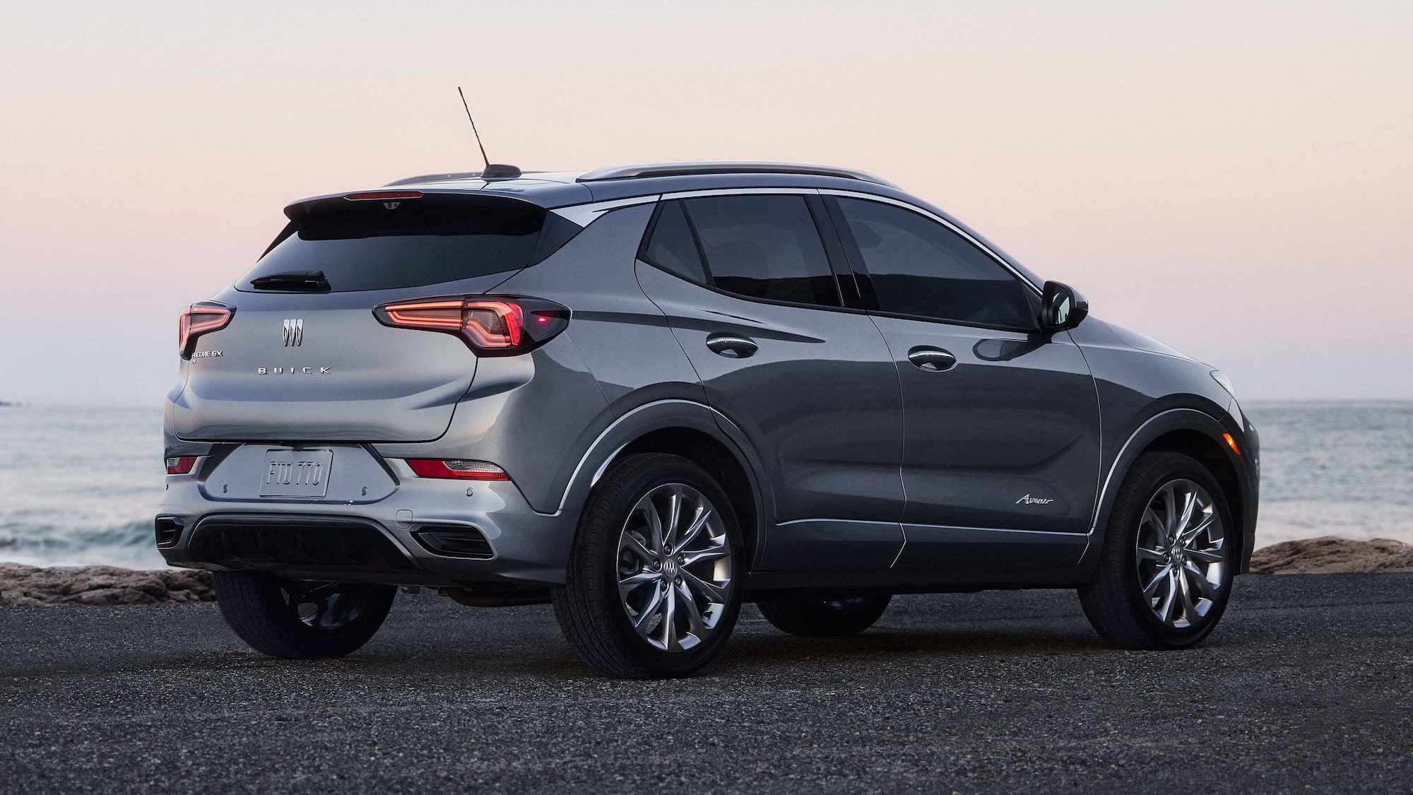 Rear Three-Quarters View of the 2026 Buick Encore GX Small SUV Parked on a Beach