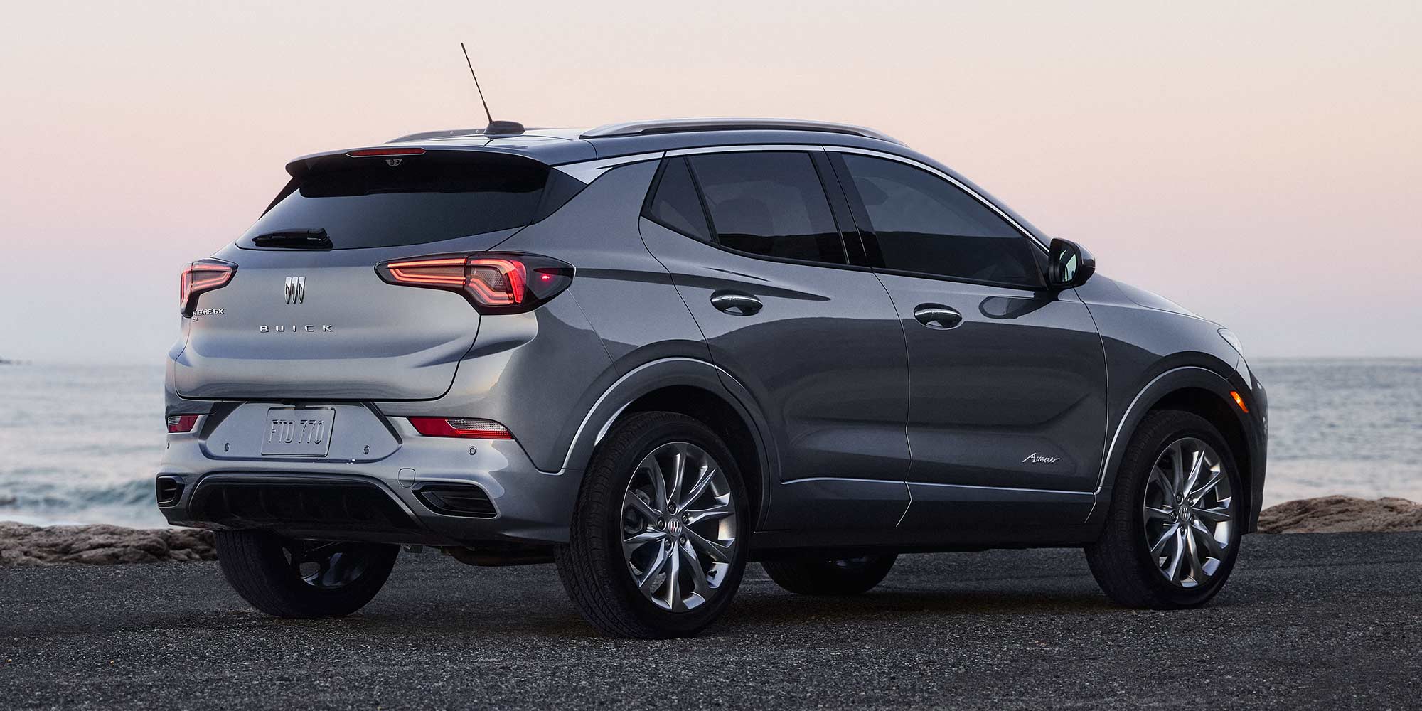 Rear Three-Quarters View of the 2026 Buick Encore GX Small SUV Parked on a Beach