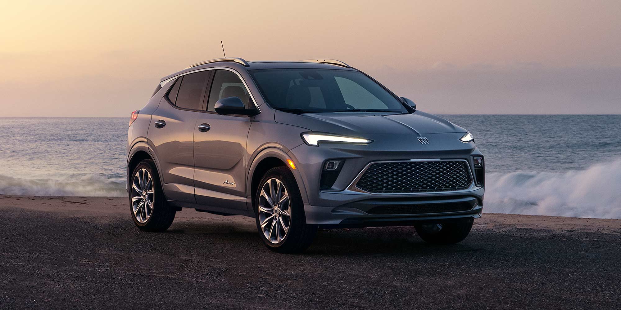 Front Three-Quarters View of the 2026 Buick Encore GX Small SUV Parked on the Beach