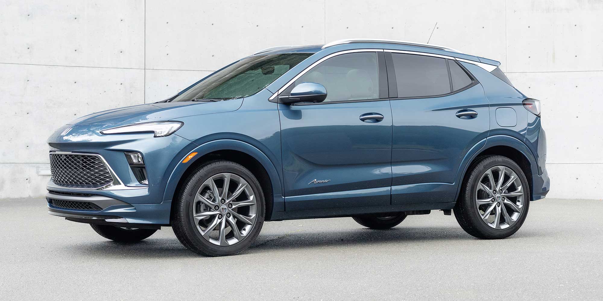 Front Three-Quarters View of the 2026 Buick Encore GX Small SUV Parked in a Driveway