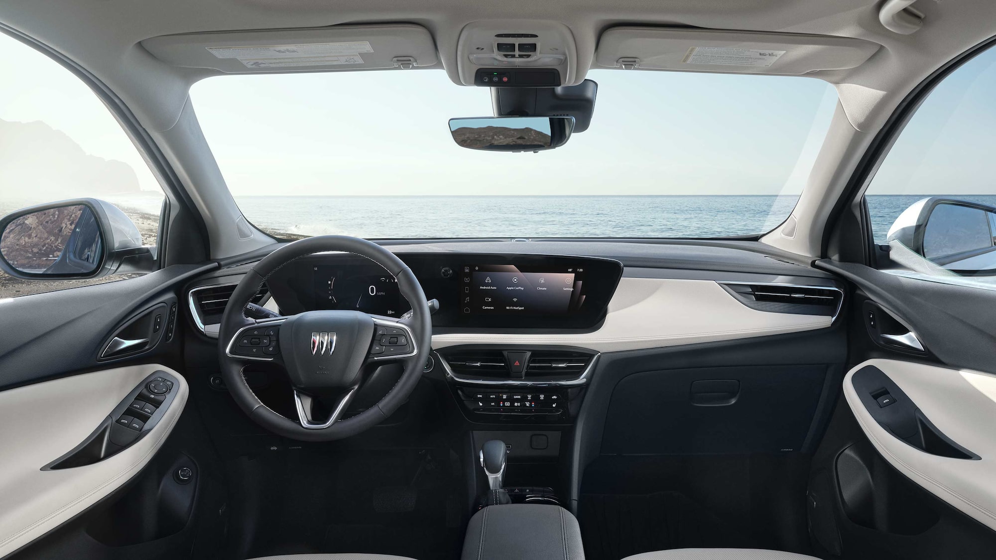 Interior View of the Buick 2026 Encore GX Small SUV's Dashboard, Steering Wheel, and Infotainment Display