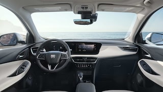 Interior View of the Buick 2026 Encore GX Small SUV's Dashboard, Steering Wheel, and Infotainment Display