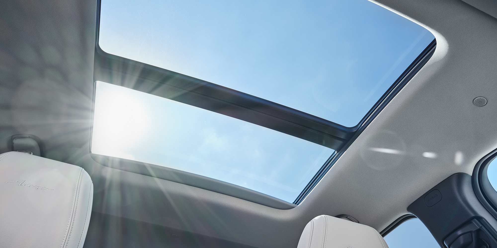 Interior View of the Sun Shining Through the Buick 2026 Encore GX Moonroof