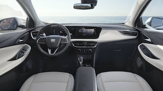 Interior View of the Buick 2026 Encore GX Small SUV's Dashboard, Steering Wheel, and Infotainment Display