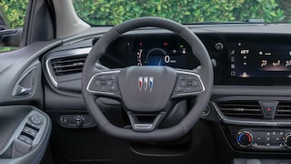 Interior View of the Buick 2026 Encore GX Small SUV's Dashboard, Steering Wheel, and Infotainment Display