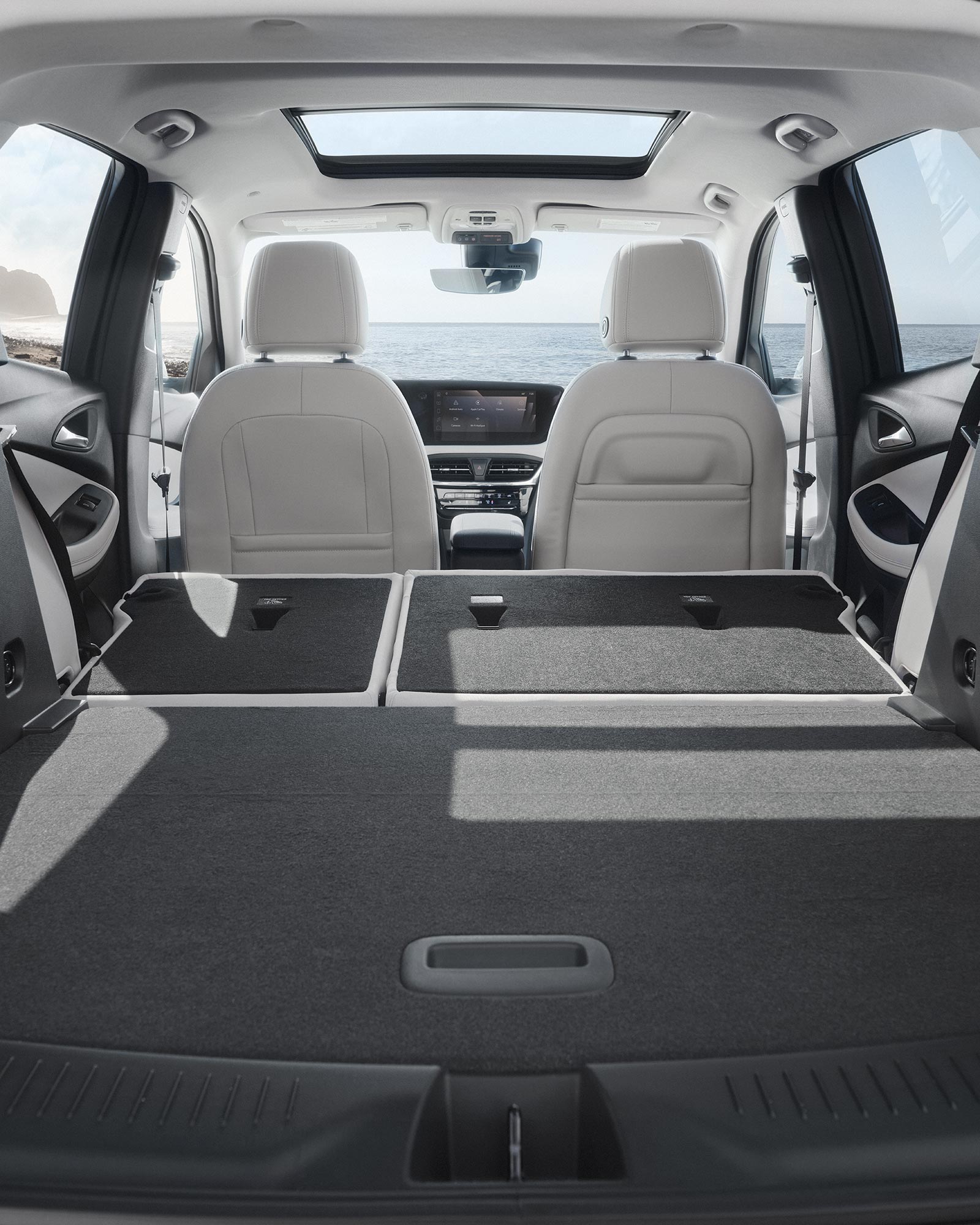 Interior View From the Rear of the Buick 2026 Encore GX Small SUV with the Rear Seats Folded Down
