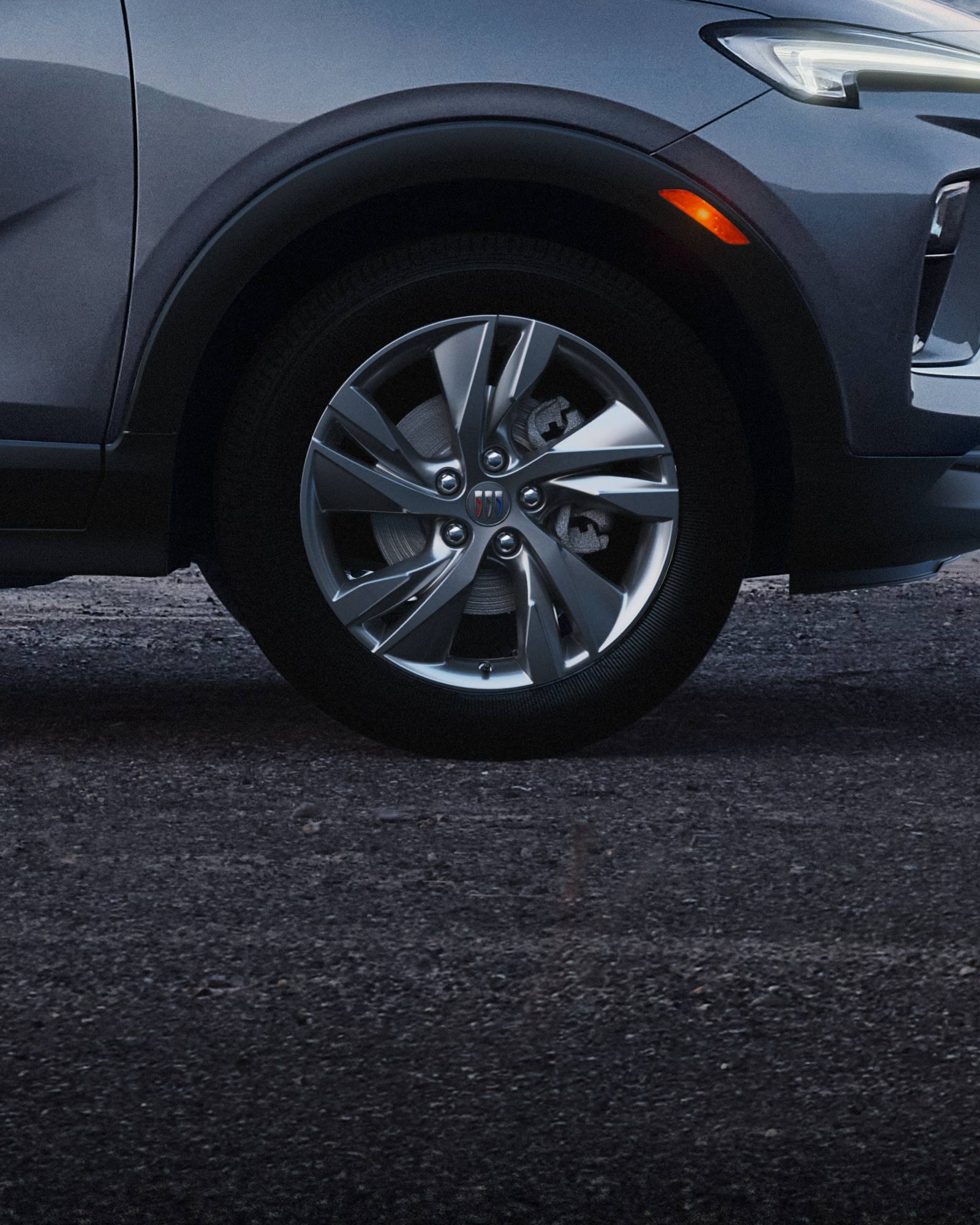 Exterior Profile View of the Buick 2026 Encore GX Preferred Subcompact SUV Parked on a Beach