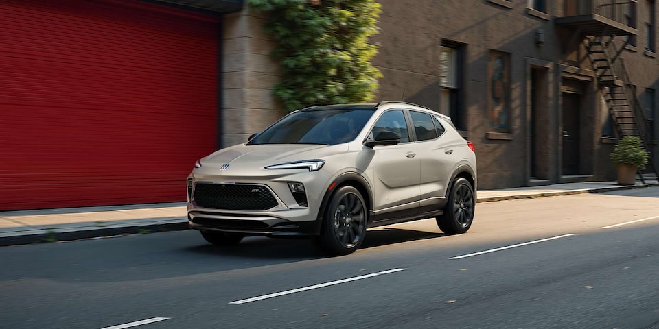 Front View of the 2026 Buick Encore GX Small SUV Parked on the Beach at Sunset