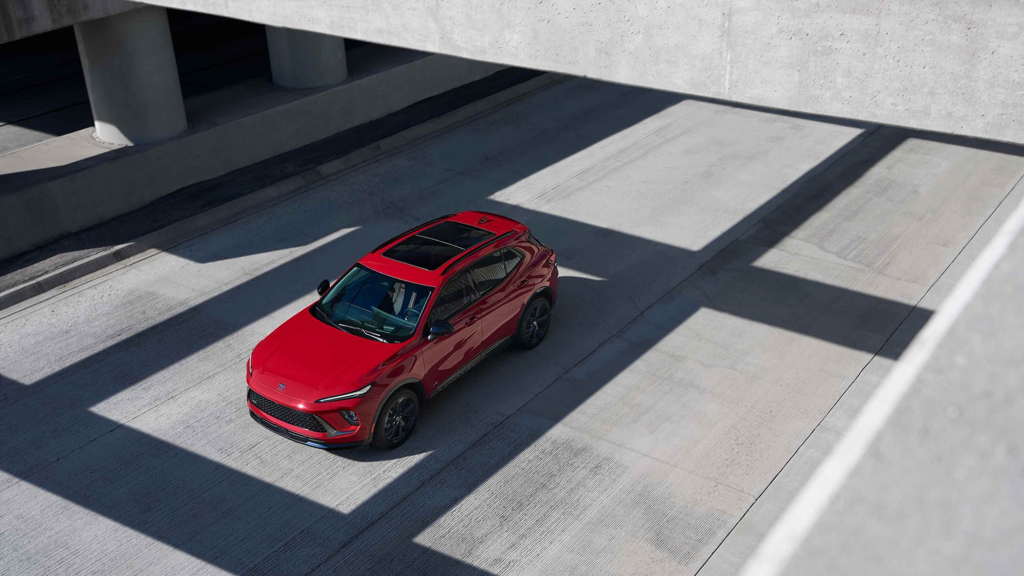 Birds-eye View of the 2026 Buick Envision Compact SUV Driving Down the Freeway