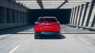 Rear View of the 2026 Buick Envision Compact SUV Driving Down a Freeway