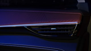 Close-up of the Air Vent in the 2026 Buick Envision with a Blue and Purple Hue