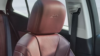 Close-up of the Headrest on the Perforated Leather-Appointed Front Seats in the 2026 Buick Envision ST Sporty Compact SUV