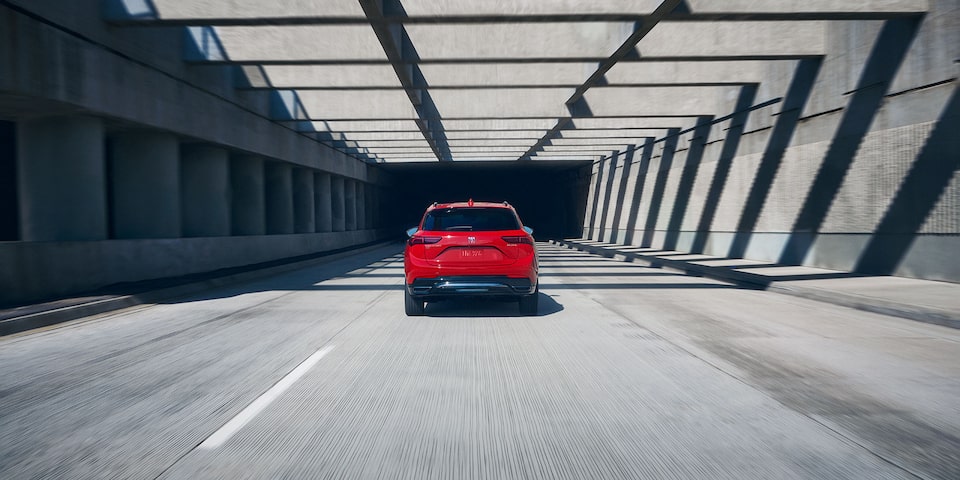 Rear View of the 2026 Buick Envision Compact SUV Driving Down the Freeway