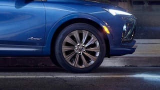 Profile Side View of the Front of a Blue 2026 Buick Envista Compact Crossover