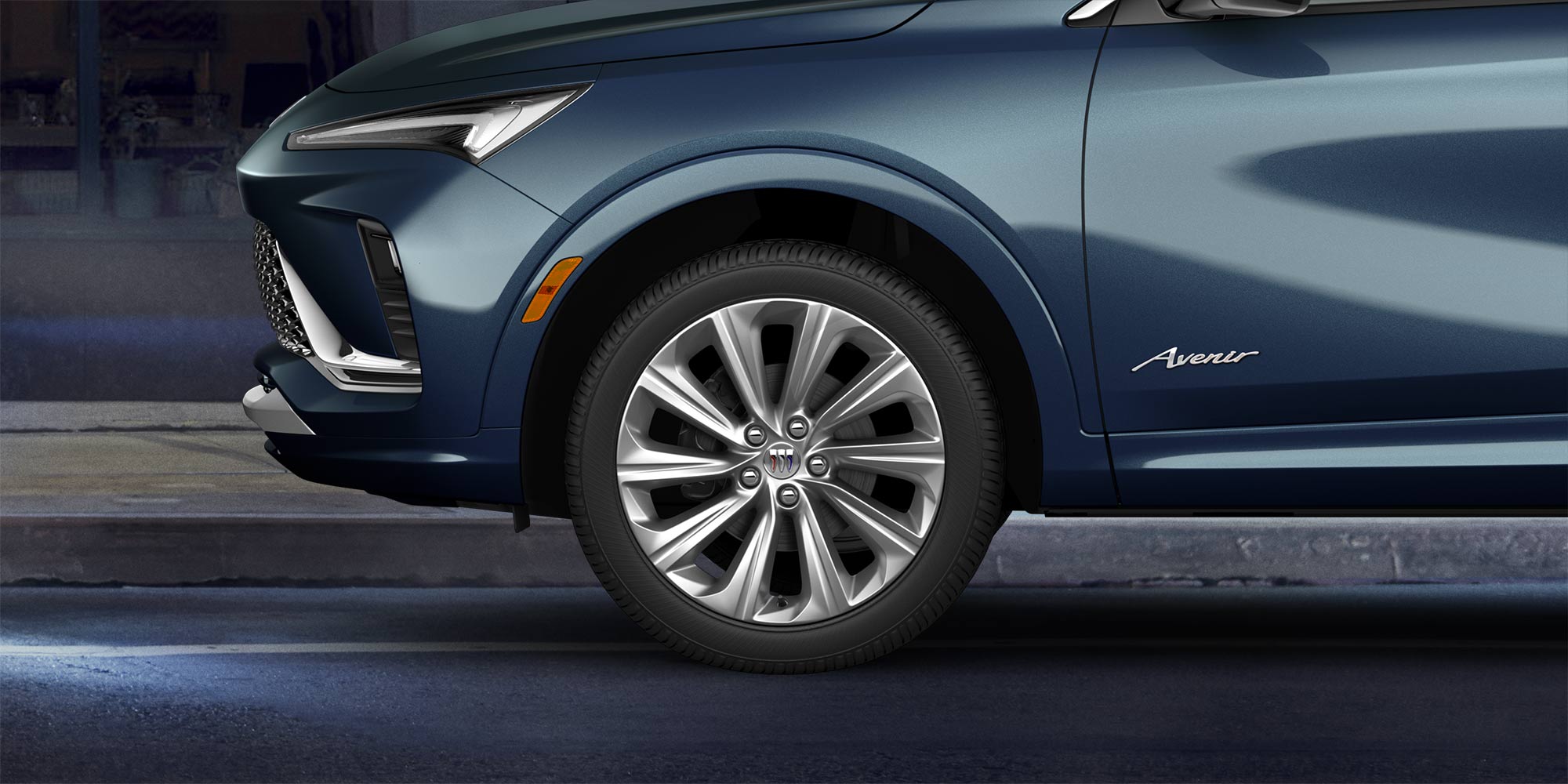 Profile Side View of the Front of a White 2026 Buick Envista Compact Crossover