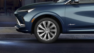 Profile Side View of the Front of a White 2026 Buick Envista Compact Crossover