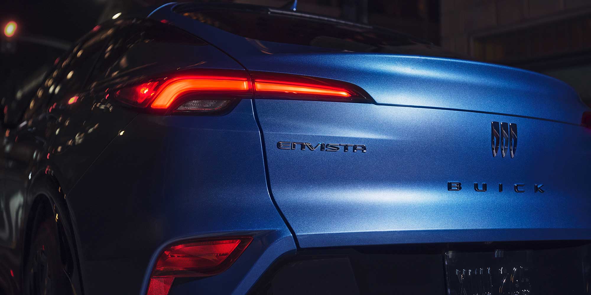 Close-up of the 2026 Buick Envista's Tail Lights on at Night
