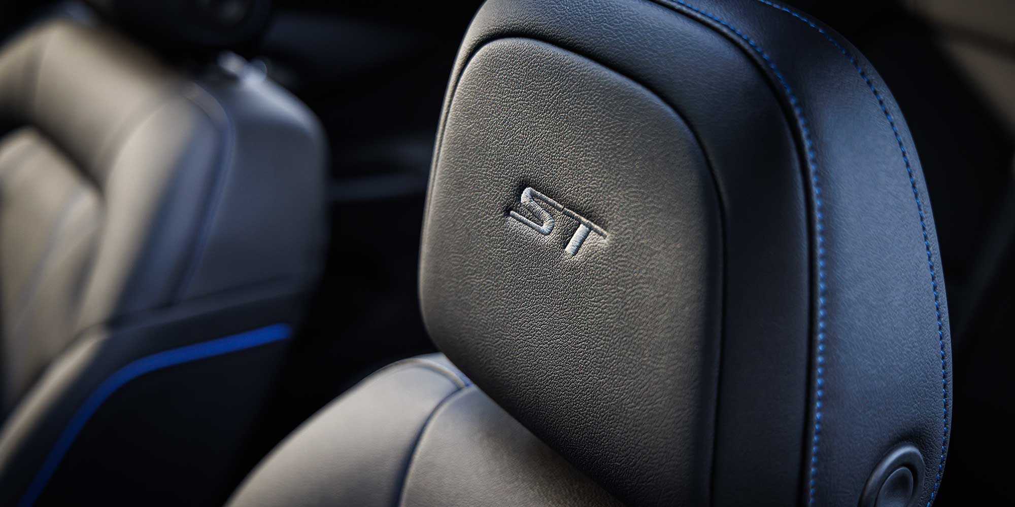 Close-up of the Embroidered ST Logo in the Seating Head Restraint of the 2026 Buick Envista ST