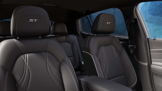 Interior View of the Ebony Seating in the 2026 Envista Sports Touring SUV with ST Stitched in the Headrests