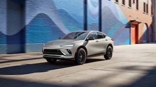 Front View of the 2026 Envista ST SUV with the Studio Series package Driving Down a City Steet