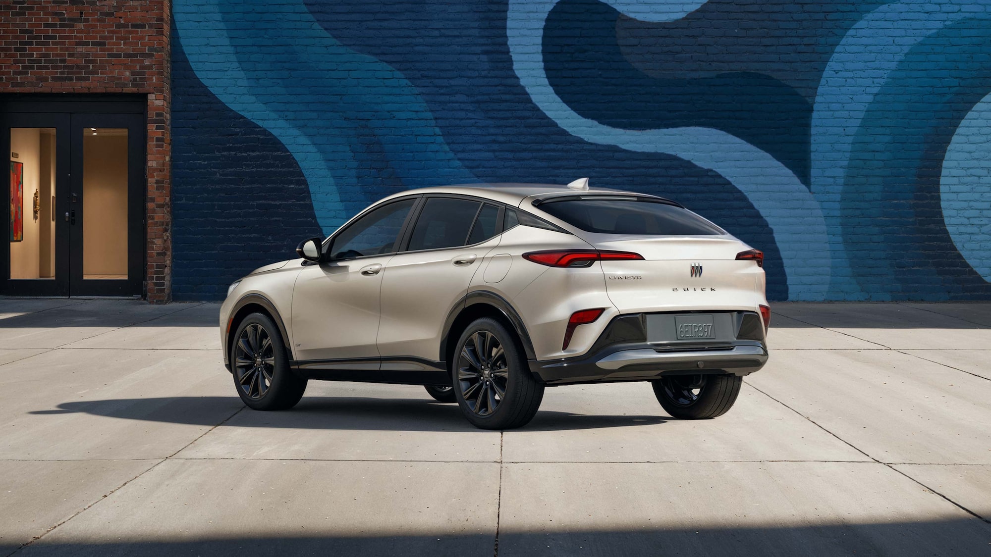 Driver Seat View of the 2026 Buick Envista Cabin and Interior Outlooking the Blurry City at Night