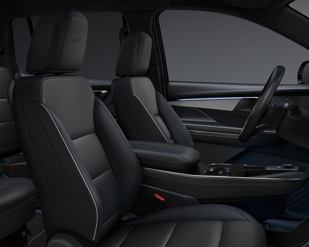 An Interior Shot of a Buick Enclave with Black Front Seats Featuring ST Embroidery
