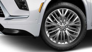 A Close-Up View of a Buick Wheel with a Chrome Finish and the Buick Tri-Shield Logo
