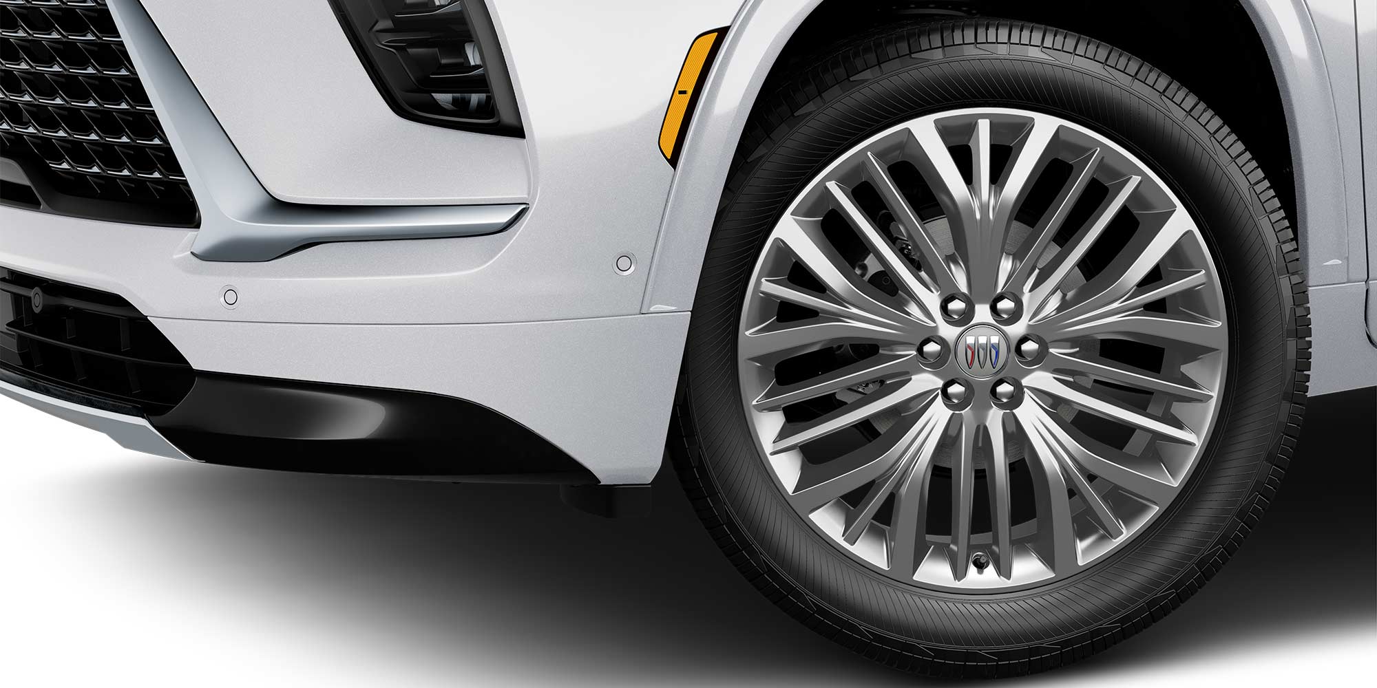 A Close-Up View of a Buick Wheel with a Chrome Finish and the Buick Tri-Shield Logo