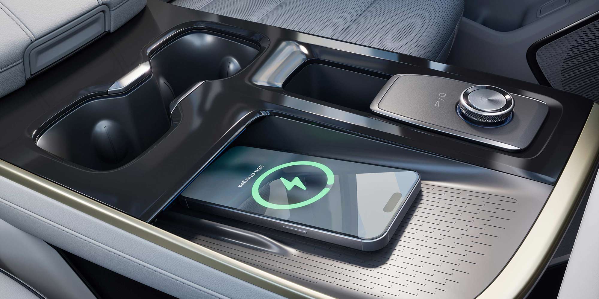 A Close-Up of the Buick Center Console with a Phone Wirelessly Charging