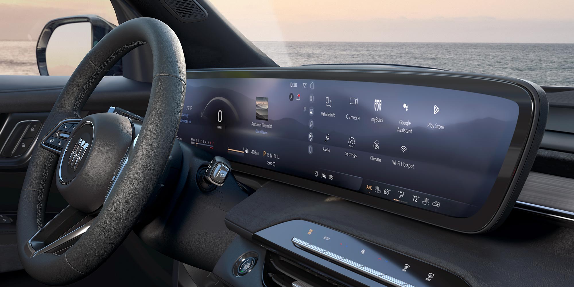 A Close-Up View of the Buick Enclave Dashboard with a Large Curved Digital Display and an Ocean Horizon in the Background