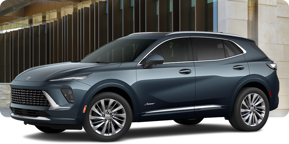 Front-Three Quarter View of a Buick Envision Avenir Luxury SUV Parked Outside a Building